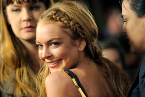 Lindsay Lohan says spending three months in rehab is pointless and she'd rather be spending time helping children overseas. Photo / AP