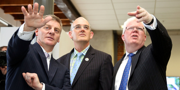 Minister of Finance Bill English, Minister for State Owned Enterprises Tony Ryall and NZX CEO Tim Bennett at the listing of Mighty River Power. Photo / Getty Images