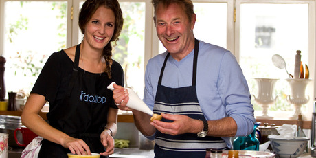 Grant bakes with Julia Crownshaw of 'NZ's Hottest Home Baker'. Photo / Michael Craig