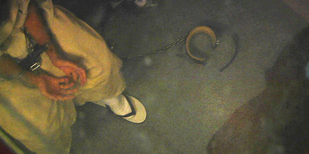 A shackled detainee meets with medical personnel in Camp 6, at Guantanamo Bay Naval Base, in Cuba. Photo / AP
