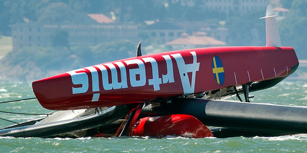 Competing for the America's Cup in AC72 catamarans is in doubt after the Artemis Racing boat capsized, killing Olympic gold medallist Andrew Simpson. Photo / AP