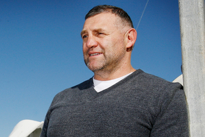 Veteran Kiwi America's Cup campaigner Craig Monk was also injured and is believed to have been taken to hospital for treatment to cuts on his hands. Photo / Greg Bowker