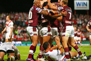 Manly celebrate the winning try by Jorge Taufua. Photo / Getty Images