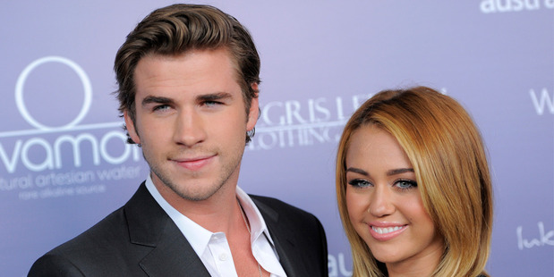 Liam Hemsworth and Miley Cyrus. Photo/AP