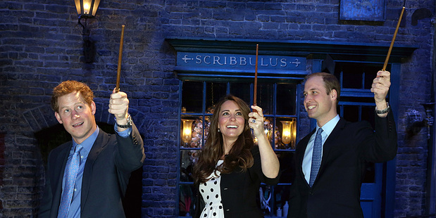 Prince Harry, left, Kate Middleton and Prince William on the set of the Harry Potter Films. Photo/AP