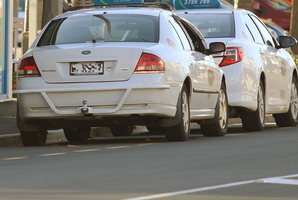 Taxi companies say tougher regulations and costly maintenance on vehicles because of damaged roads meant six operators had stopped since the earthquakes. Photo / Geoff Sloan