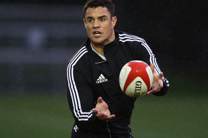 Dan Carter, on holiday in Taupo, created a stir on Twitter today when asking his 130,000 followers if anyone would be keen to return his kicks for him. Photo / Getty Images.