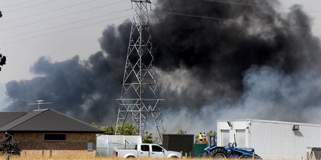 Smoke billows from a scrub fire in Shands Road in the Prebbleton area of Christchurch. Photo / Martin Hunter