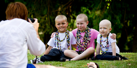 The faces of the Child Cancer Foundation for 2013, (from left) Hilton McCullough, 5, Myah Tasker, 6, and Emilie Johns, 4, pose for photographer Sam Mothersole. Photo / Dean Purcell