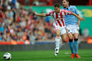 Michael Owen is reportedly keen to move from Stoke City where he has struggled to get regular game time. Photo / AP