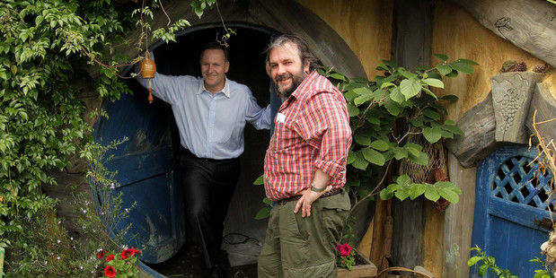 John Key (left) has defended the Warners tax incentives saying Peter Jackson's first Hobbit film alone hired 3000 people. Photo / Alan Gibson