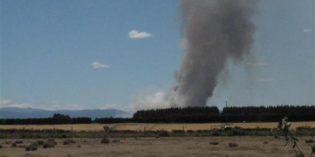 The fire burning near West Melton in Canterbury. Photo / Simon Lewis