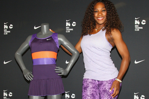 Serena Williams poses with her outfit which she will debut at the 2013 Australian Open. Photo / Getty Images