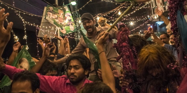 Supporters of Pakistan Muslim League-N (PMLN) celebrate election results in Lahore, Pakistan. Photo / Getty
