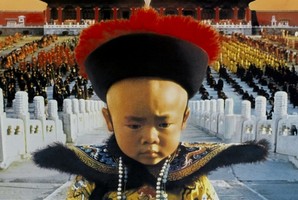 The palace in the Forbidden City is a tourist attraction. Above, the young Puyi in The Last Emperor . Photo / AP