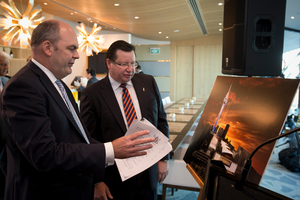 Economic Development Minister Steven Joyce and SkyCity chief executive Nigel Morrison look over plans for the new convention centre at a media briefing in Auckland this morning. Photo / Greg Bowker