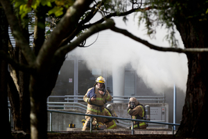 Firefighters at Auckland University's Epsom campus today. Photo / Richard Robinson