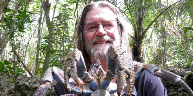 Graham Reid holds a giant land crab on Niue. The crustaceans make delicious eating. Photo / Graham Reid