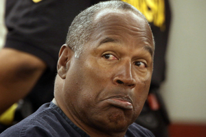 O.J. Simpson, now 65, was convicted of stealing sports memorabilia at gunpoint. Photo / AP