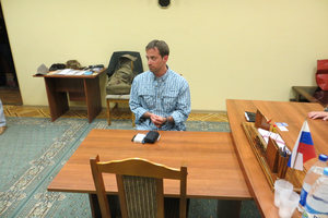 A man claimed by FSB to be Ryan Fogle, a third secretary at the U.S. Embassy in Moscow, sits in the FSB offices. Photo / AP