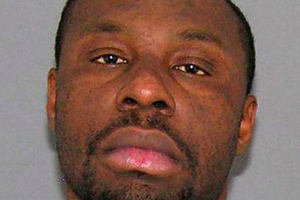 Ricardo Woods was found guilty today in the shooting death of a man who authorities say identified his assailant by blinking his eyes . Photo / AP