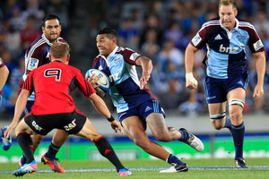 Blues player Charles Piutau was part of the winning combination that beat the Crusaders 34-15 in March. But for tomorrow's match the Blues see themselves as underdogs. Photo / Richard Robinson