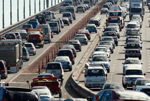 NZ Transport Agency group is responsible for shifting the concrete lane barrier on the Auckland Harbour Bridge. Photo / Brett Phibbs