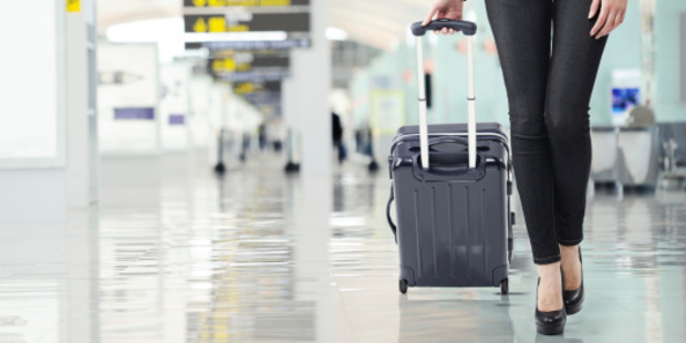 Are female travellers taking up their partners luggage space? Photo / Thinkstock
