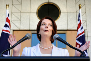 Prime Minister Julia Gillard challenged Opposition Leader Tony Abbott to allow his MPs to have a conscience vote on gay marriage. Photo / AP