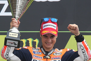 MotoGP rider Dani Pedrosa of Spain celebrates on the podium after winning the French Grand Prix, at Le Mans. Photo / AP