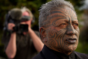 Tame Iti makes his way from his marae to speak to media in Ruatoki in the Eastern Bay of Plenty. Photo / NZ Herald