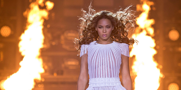 Beyonce performs on stage during her Mrs. Carter Show World Tour 2013. Photo/AP