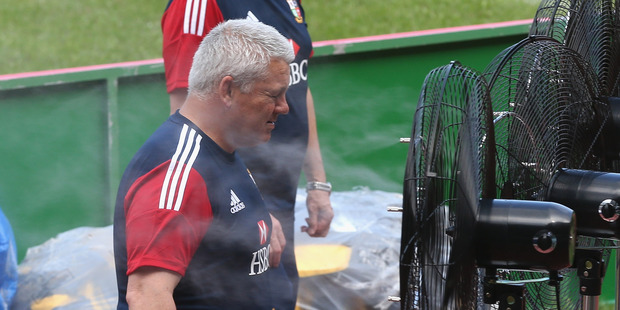Warren Gatland has just found his biggest fan during a training session in Hong Kong. Photo Getty Images