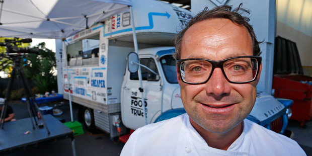 Chef Michael Van De Elzen prepares Thai food in the Food Truck. Photo / Getty Images