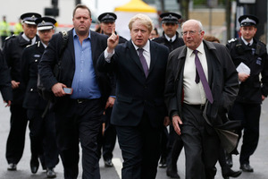 London Mayor Boris Johnson (centre) says Britons must focus on unity. Photo / AP