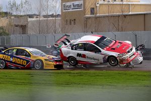 Simon McLennan gets airborne with Kayne Scott behind at Pukekohe V8 SuperTourers. Picture / Neville Bailey