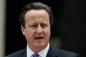 David Cameron has been criticised in some British newspapers for taking a holiday in Ibiza while the Woolwich attack is being investigated. Photo / AP