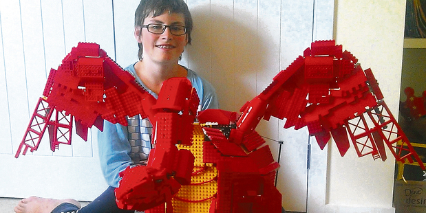 Stania Kelgr with his award winning dragon. Photo / Te Awamutu Courier