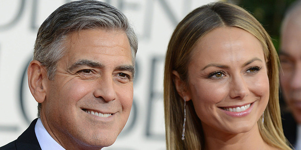George Clooney and Stacey Keibler at the Golden Globes. Photo/AP