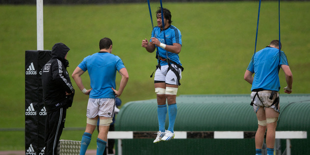 All Black Steven Luatua gets some hanging time during a training session at Waitakere yesterday. Photo / Brett Phibbs
