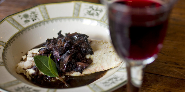 Martin Bosley's grilled fish with red wine and mushroom ragout. Photo / Michael Craig