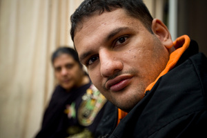 Tahira Siddiqui, left, and her autistic son, Ali, who was injured in a house fire. Photo / Michael Craig