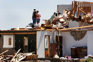 Union City residents search for whatever can be salvaged from the ruins of a home hit by Saturday's tornado. Photo / AP