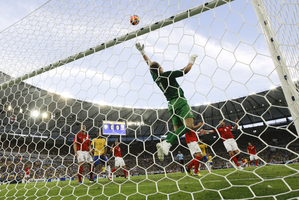 Joe Hart blocks a header from Brazil's Fred as England hold Brazil to a draw at revamped Maracana. Photo / AP