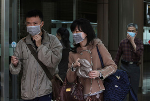 Taiwanese people wear masks at National Taiwan University Hospital in Taipei, Taiwan. Photo / AP