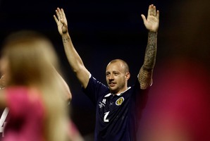 Scotland's Alan Hutton celebrates his team's victory over Croatia in their group A World Cup qualifying soccer match in Zagreb, Croatia, Friday, June 7, 2013. (AP Photo/Darko Bandic)