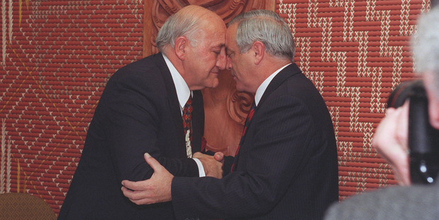Ngai Tahu chief negotiator Sir Tipene O'Regan accepts a settlement from then Minister for Treaty Negotiations Douglas Graham. Photo / Mark Mitchell
