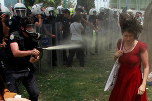 The image of Turkish police tear-gassing Ceyda Sungur in Taksim Square has gone viral. Photo / Reuters