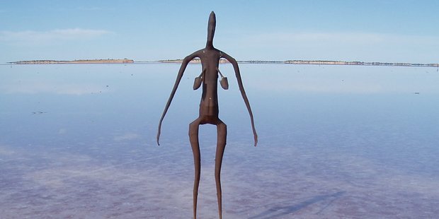 Antony Gormley's metal figures on the saltpan of Lake Ballard accentuate the arid, lonesome emptiness of the region. Photo / Supplied