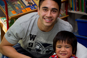 Warriors player Shaun Johnson says being able to do something positive for children like 3-year-old Gideon Fe'ao is a great feeling. Photo / Sarah Ivey